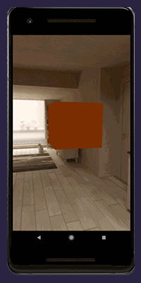 An animated gif of a phone showing a 3D object floating in a room in XR